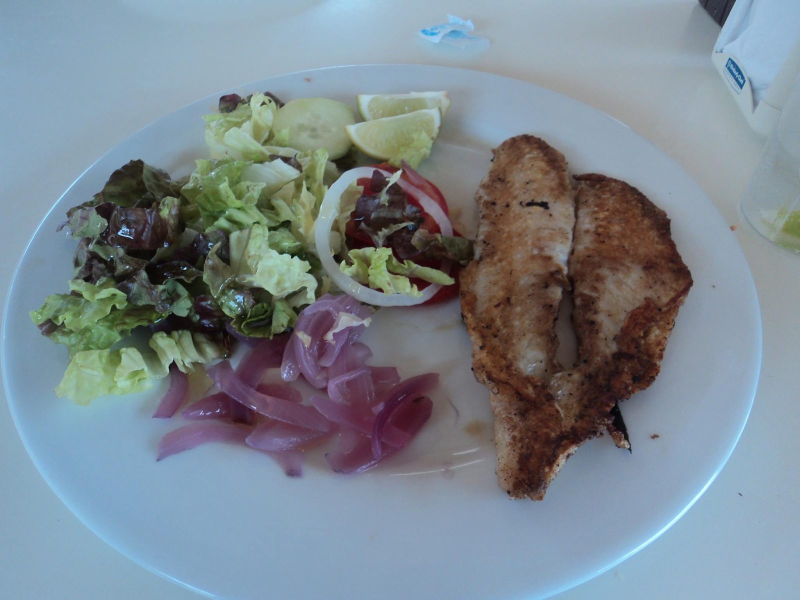 Grilled fish at Punta Emila beach bar at lunch